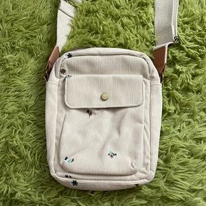 Universal thread floral + corduroy crossbody bag